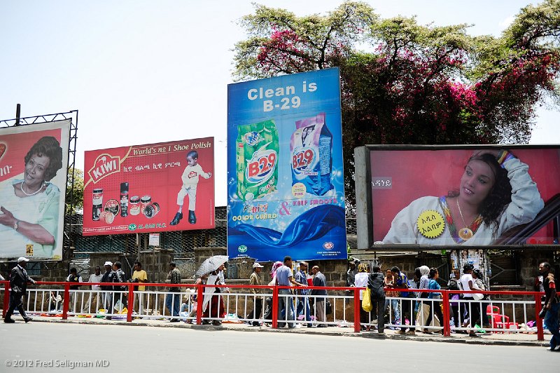 20120327_121038 Nikon D3S 2x3.jpg - There are several large roundabouts and plazas where people congregate.  The large billboard is a popular mathod of advertisement.